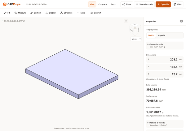 CADProps 3D workspace showing a CAD model with dimensions, solid volume, surface area and density-based mass.